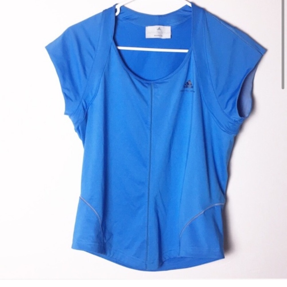 Adidas Stella McCartney blue workout barricade top
Excellent condition medium